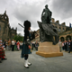 A crowd gather to watch the unveiling of a 10ft bronze statue of Scottish economist, philosopher and author Adam Smith (1723-1790) at the Royal Mile on July 4, 2008 in Edinburgh, Scotland.